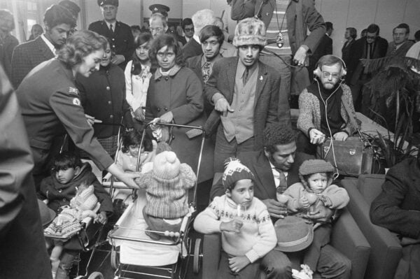 Group of South Asian migrant families arriving in Netherlands