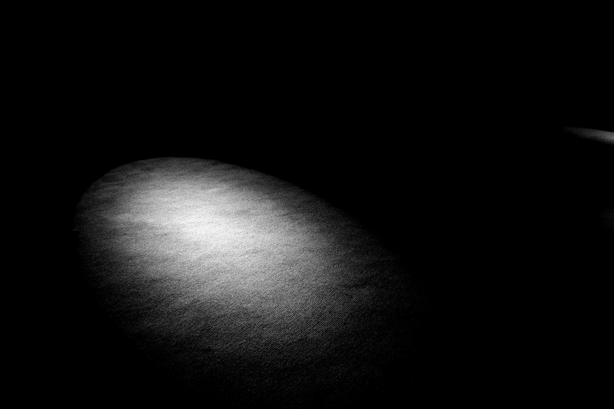 Spotlight on a dark background